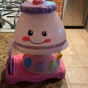 Very cute lamp toy… the color of the lights change, and sings songs